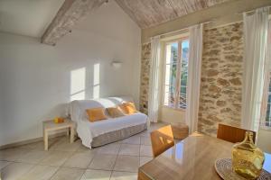 En eller flere senge i et værelse på La Bastide du Soleil