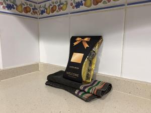 a bag of cheese and a towel on a counter at Chicflat Avenida España. Ideal para familias in Estepona