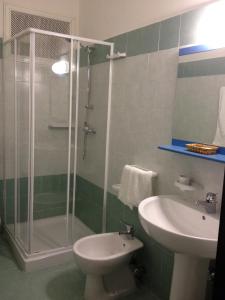 Koupelna v ubytování Hotel Rivabella