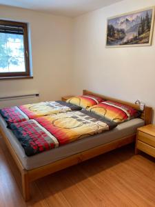 Ένα ή περισσότερα κρεβάτια σε δωμάτιο στο Apartmán pod kopcom