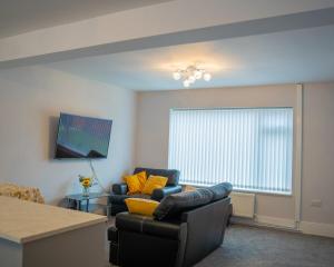 Ruang duduk di Calmhaven Apartments Hucknall
