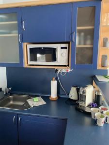 Kuchyň nebo kuchyňský kout v ubytování Apartmán Pec 322