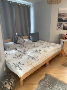 Postel nebo postele na pokoji v ubytování Apartmán Pec 322