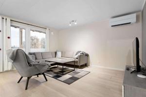 Posezení v ubytování Lovly 3 Bedroom apartment with the view of aurora