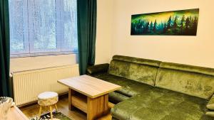 Posezení v ubytování Rodinný apartmán na Šumavě