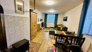 Posezení v ubytování Rodinný apartmán na Šumavě