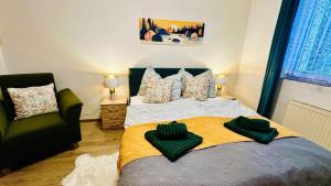 Postel nebo postele na pokoji v ubytování Rodinný apartmán na Šumavě