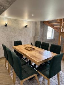 Posezení v ubytování Vinor Cottage