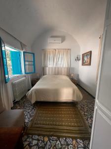 Postel nebo postele na pokoji v ubytování Raf Guest House