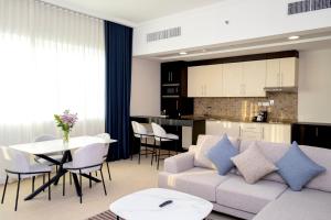 Kuchyň nebo kuchyňský kout v ubytování Jannah Executive Hotel Apartments