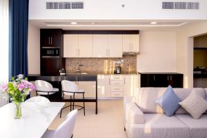 Kuchyň nebo kuchyňský kout v ubytování Jannah Executive Hotel Apartments