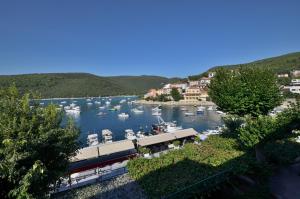 a view of a marina with boats in the water at Lori Rabac App in Rabac