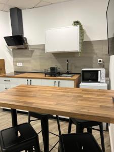 A kitchen or kitchenette at Alojamientos Rurales Cuatro Estaciones