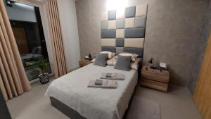 Posteľ alebo postele v izbe v ubytovaní Premium Apartment Eleven