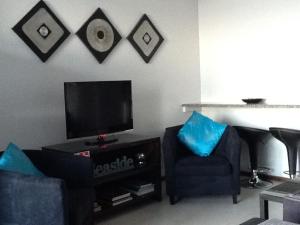 Μια τηλεόραση ή/και κέντρο ψυχαγωγίας στο 8 Ocean Breeze