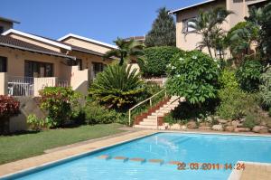 Πισίνα στο ή κοντά στο 8 Ocean Breeze