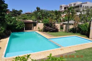 Πισίνα στο ή κοντά στο 8 Ocean Breeze +9 φωτογραφίες