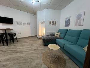 A seating area at Alojamientos Rurales Cuatro Estaciones