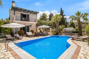 Fotografia z galérie ubytovania Goudis Villas v destinácii Tsoukalades