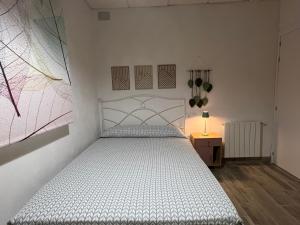A bed or beds in a room at Alojamientos Rurales Cuatro Estaciones