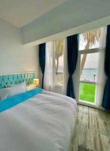 Postel nebo postele na pokoji v ubytování ايارنوب - iaru nub