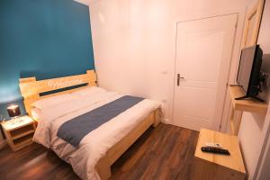 Postel nebo postele na pokoji v ubytování Hotel Sidi