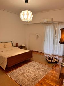 Ένα ή περισσότερα κρεβάτια σε δωμάτιο στο Mylos House +20 φωτογραφίες