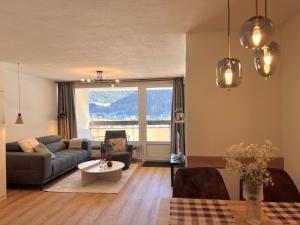 Area soggiorno di New renovated apartment in center of Davos