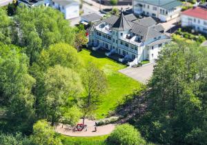 an aerial view of a large house in a city at Schlösschen am Meer in Binz