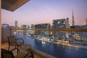 a balcony with a view of a city skyline at Royal Continental Suites Business Bay - Deluxe Apartments in Dubai
