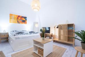 Posteľ alebo postele v izbe v ubytovaní Studio In The Heart Of Party District KA28