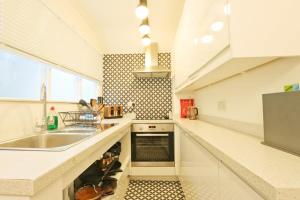 Η κουζίνα ή μικρή κουζίνα στο Chic One Bed Apartment in Clifton