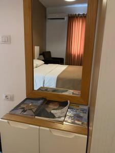 Postel nebo postele na pokoji v ubytování Hotel Sidi