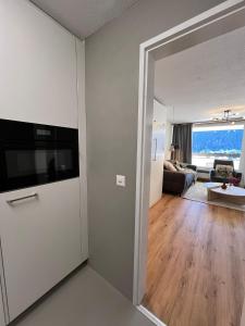 TV o dispositivi per l'intrattenimento presso New renovated apartment in center of Davos