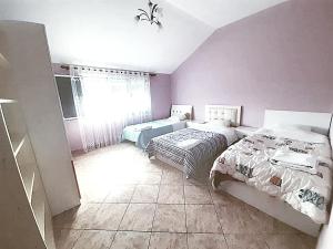 Una cama o camas en una habitación de Villas Maria for rent feeling Home