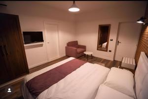 Postel nebo postele na pokoji v ubytování Hotel Sidi