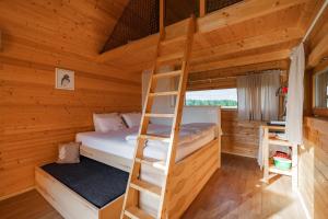 Postel nebo postele na pokoji v ubytování Glamping Kolpa Resort