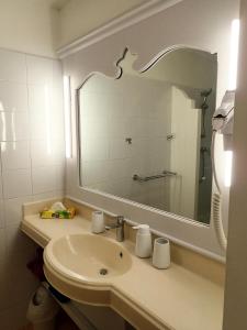 Et badeværelse på Résidence P&V studio ANTIGUA 4 + 36 billeder