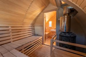 Gallery image of Pine Valley Villa - beautiful nature, jacuzzi, sauna, cozy log house in Inturkė