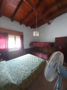 Postel nebo postele na pokoji v ubytování Don Nene