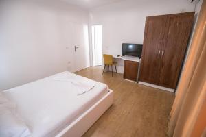 Postel nebo postele na pokoji v ubytování Hotel Sidi