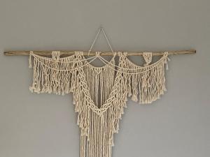 a string of white crochet hanging on a stick at Balat Boutique Hotel in Istanbul +114 photos