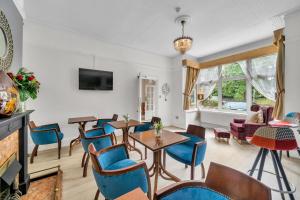 TV a/nebo společenská místnost v ubytování Dial House Hotel