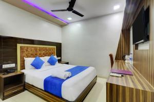 Postel nebo postele na pokoji v ubytování Hotel Blue Terminal