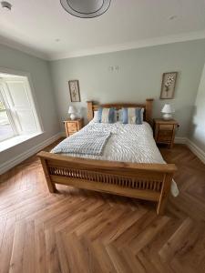 Postel nebo postele na pokoji v ubytování Drumconnick House