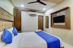 Postel nebo postele na pokoji v ubytování Hotel Blue Terminal