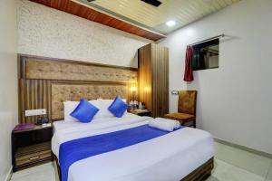 Postel nebo postele na pokoji v ubytování Hotel Blue Terminal