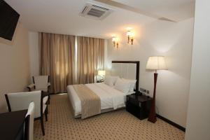 Postel nebo postele na pokoji v ubytování El khayem Hotel + 14 fotografií