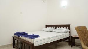 Ένα ή περισσότερα κρεβάτια σε δωμάτιο στο Araliya Golden Hotel