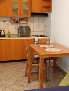 Kuchyň nebo kuchyňský kout v ubytování Apartman Mare